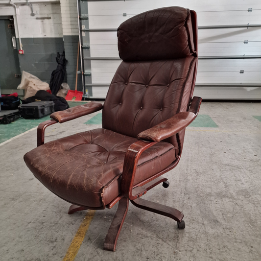 1970s Brown Leather Swivel Arm Chair