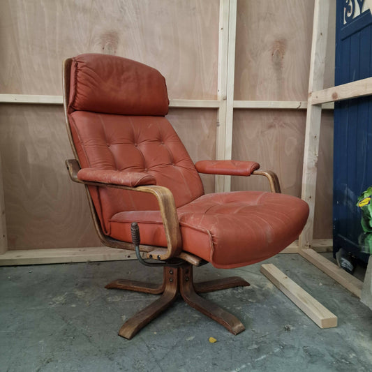 1970s Red Leather Swivel Arm Chair